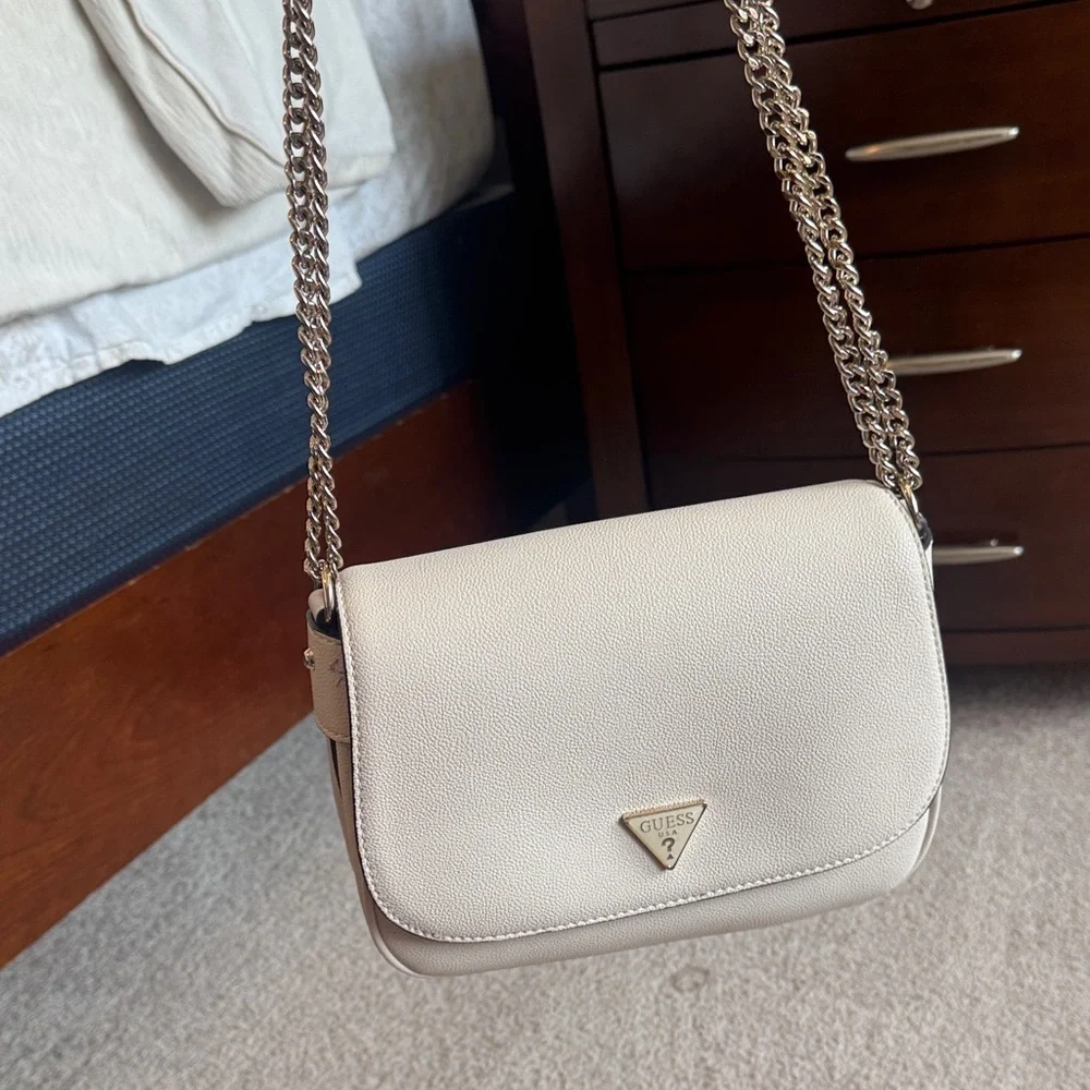 GUESS Cream Pebbled Leather Crossbody with Gold Triangle Logo